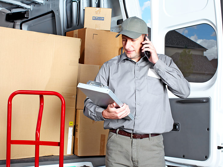 A member of the Office Environments team arrives on location to deliver and install commercial office furniture.